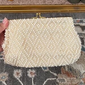 Elegant Pearl-Embellished Cream Clutch